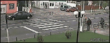 Bicyclist_dump_truck.gif